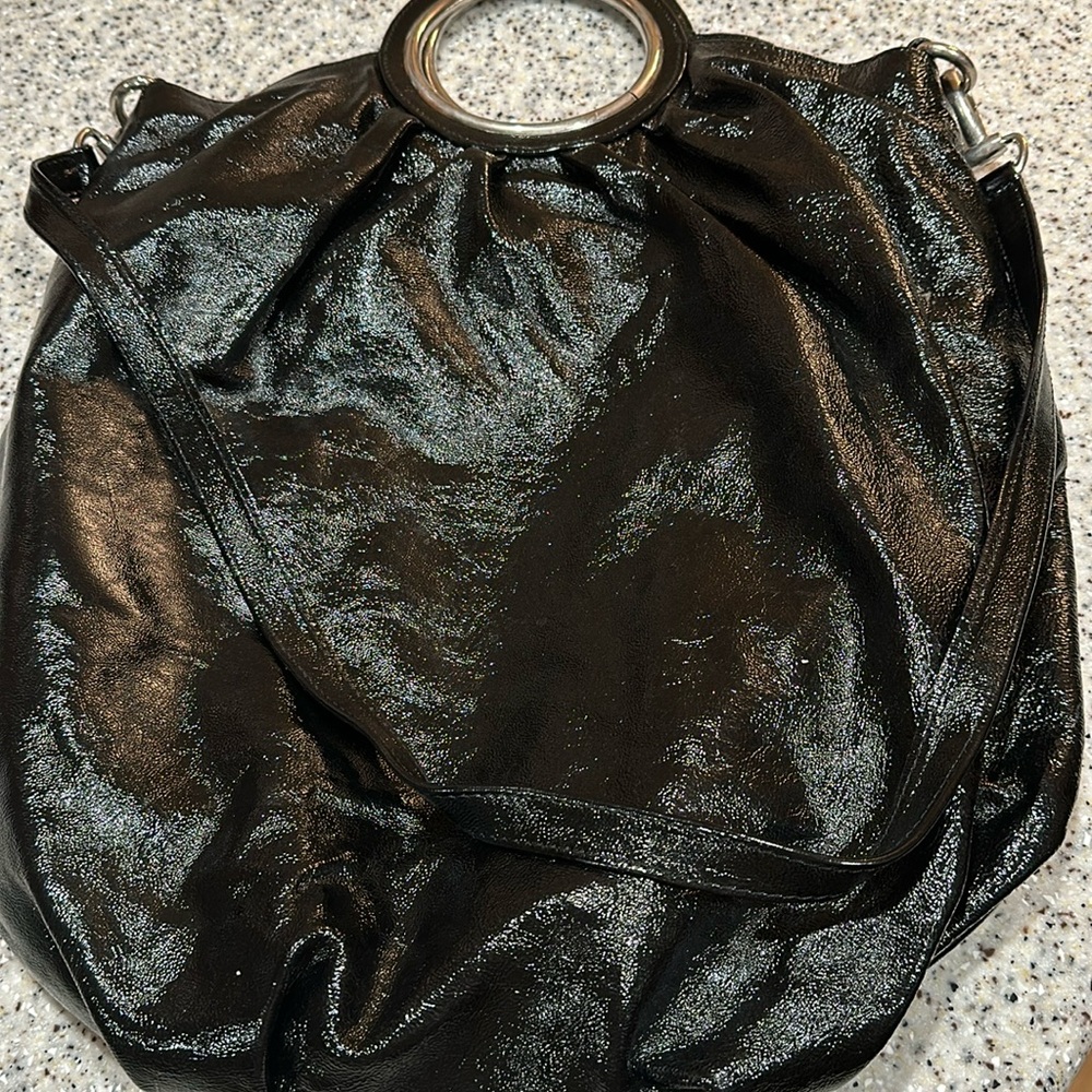 Very cute long black shinny purse